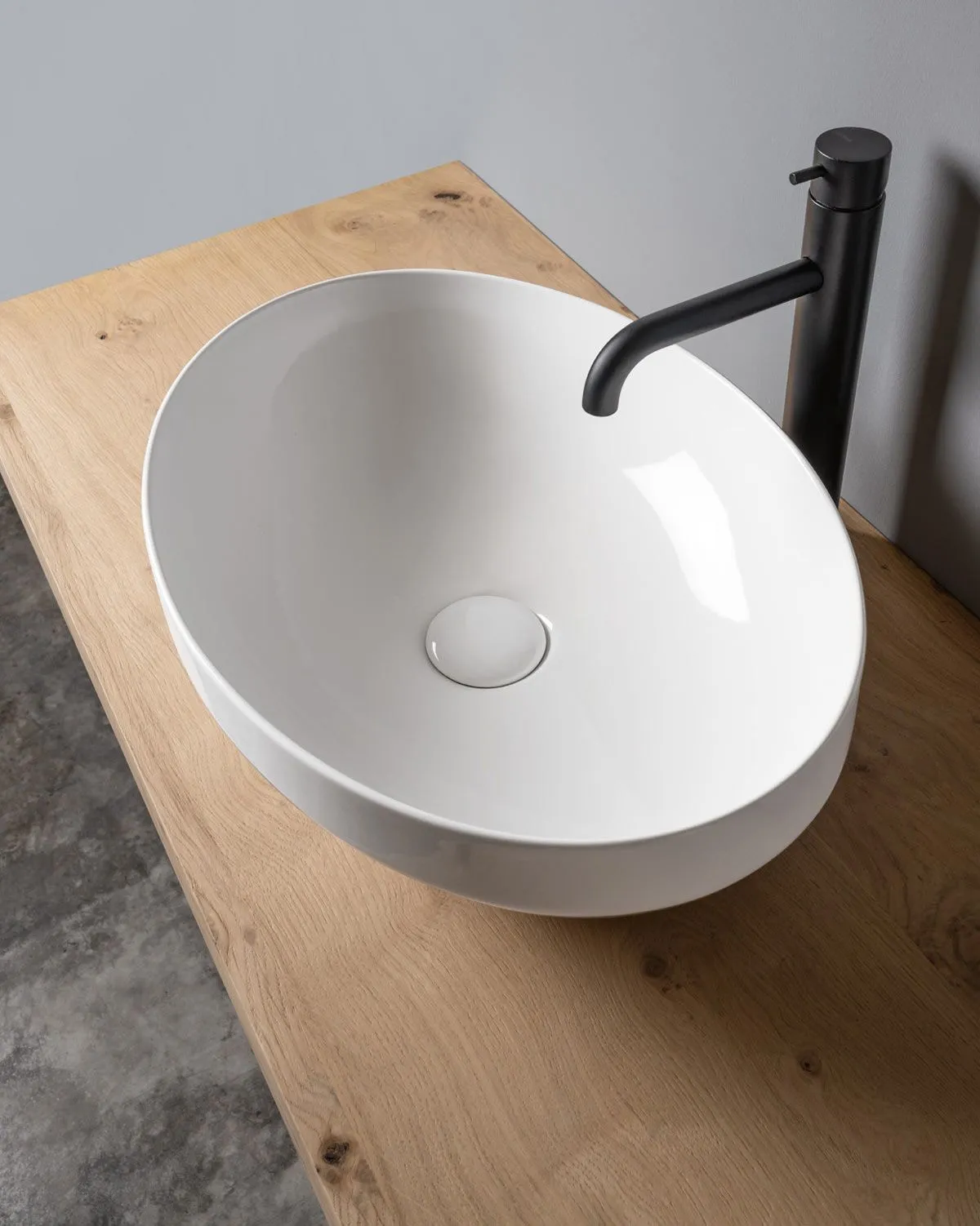 Decus Раковина овальна на стільницю 50*35 см, білий